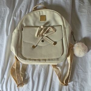 Cream Backpack with Pom Pom